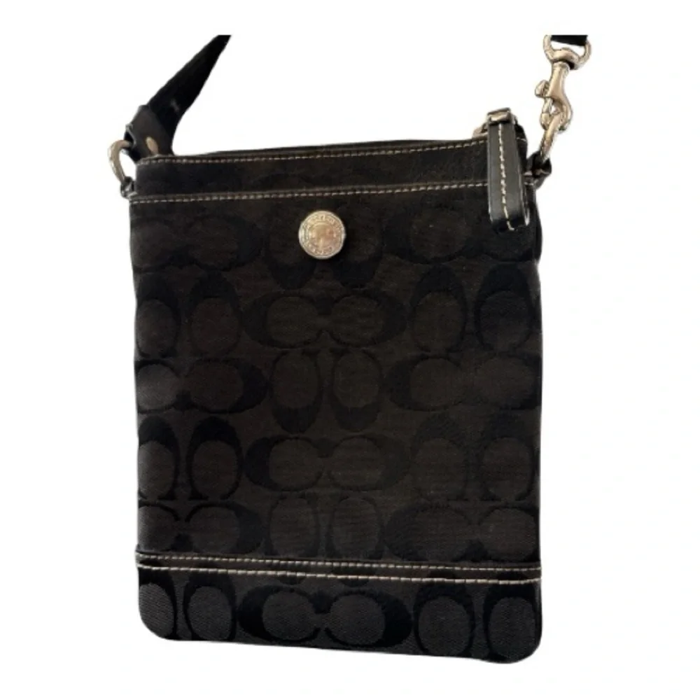 COACH vintage crossbody bag, jacquard black, adjustable strap, zipper top.